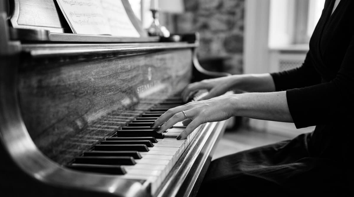Hands playing piano keys - Harmony Heavens Piano Academy Goregaon Mumbai
